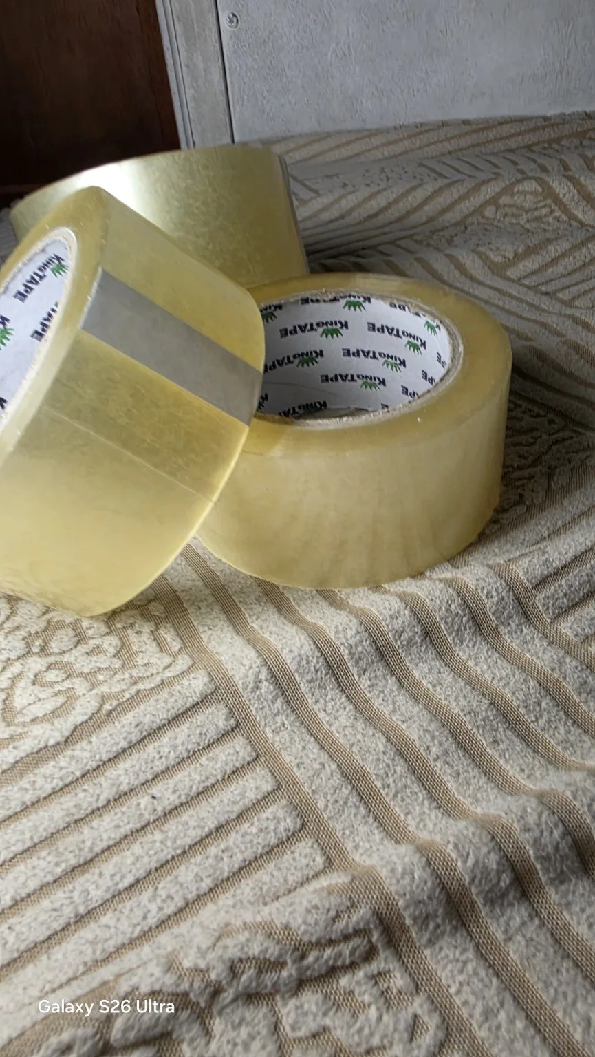 Close-up original photo of clear carton sealing tape rolls from JFAM Packaging