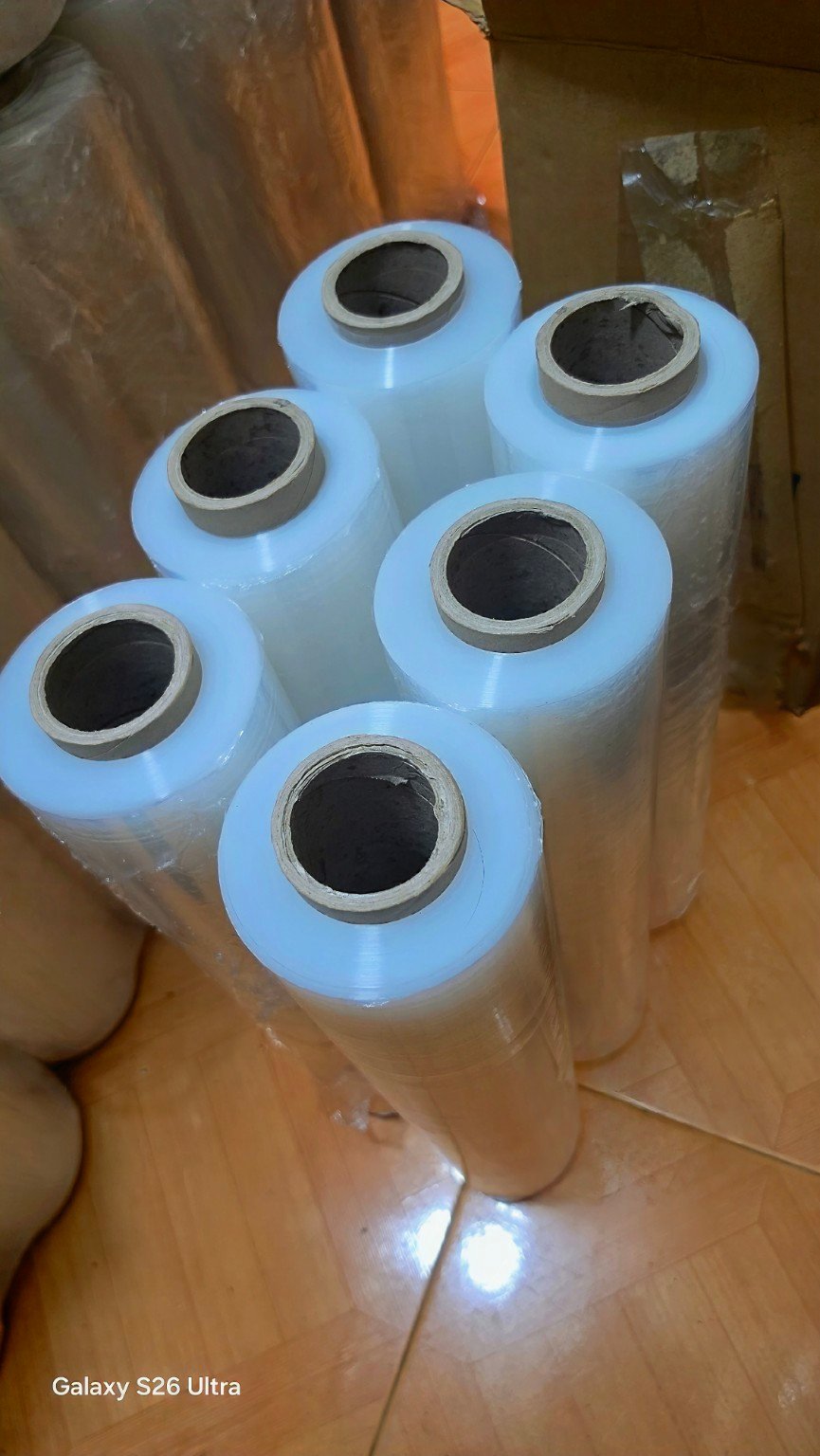 Angled top view of clear stretch film rolls standing together